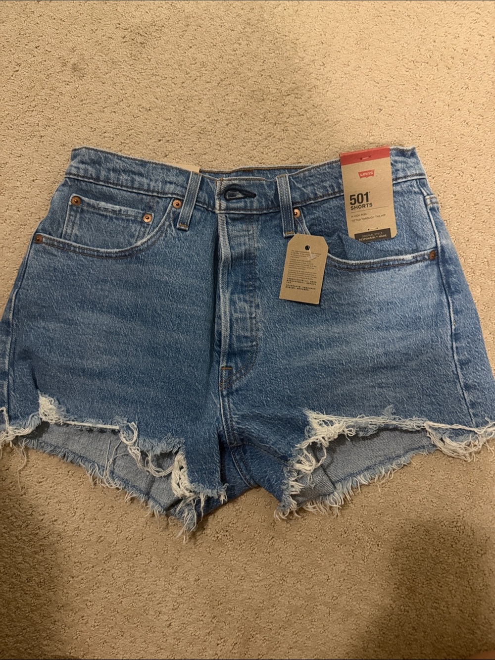 Levi's 501 Cutoff Distressed Denim Shorts in Light Blue